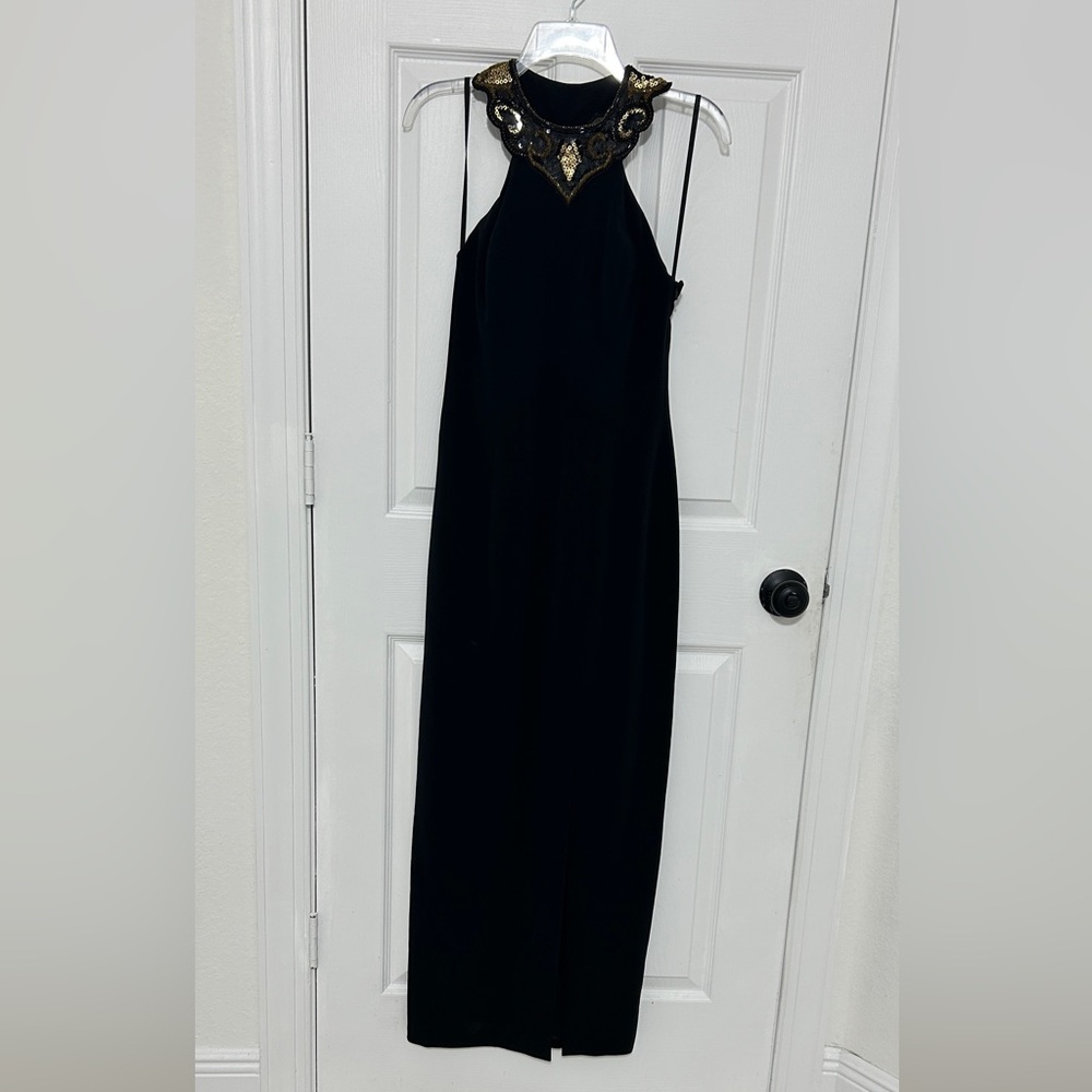 Elegant Black Gown with Gold Embellishments